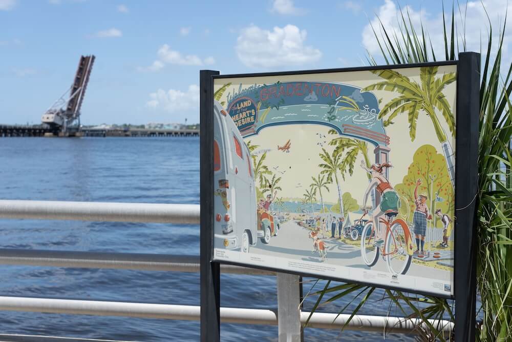 freestanding postcard with a view of the manatee river