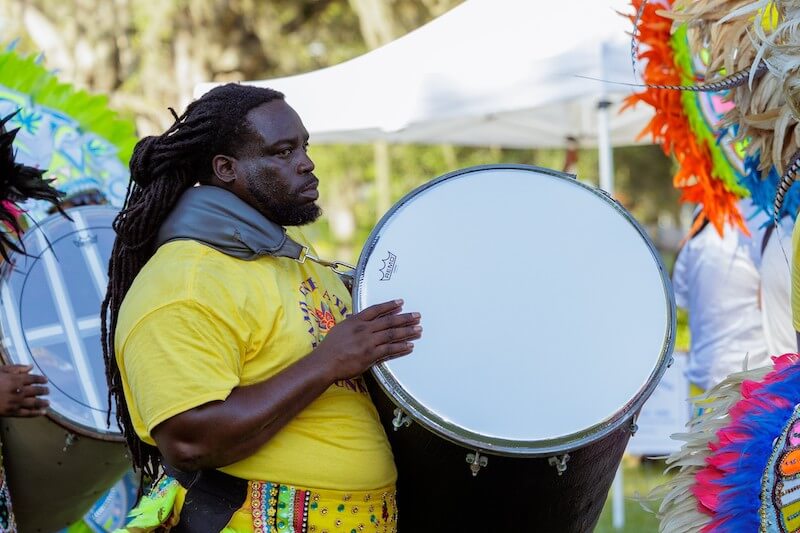 a man playing a drum